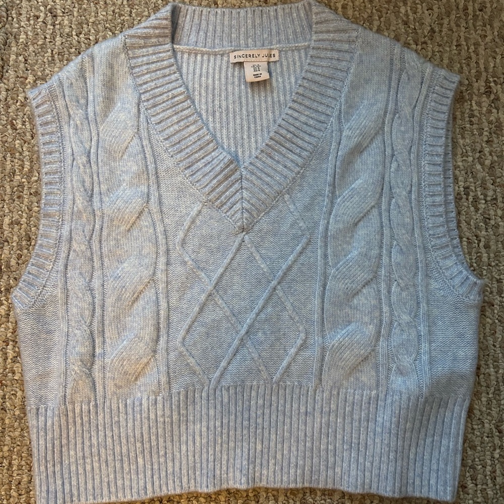 Light blue sleeveless sweater